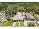 Charming single Gathering home with a well manicured front yard and a long driveway at 419 W Osborne Ave, Tampa, FL 33603