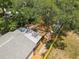 Aerial shot featuring a fully fenced backyard with beautiful landscaping at 419 W Osborne Ave, Tampa, FL 33603