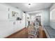 Open-concept kitchen and dining area with stainless appliances and dining nook seating at 419 W Osborne Ave, Tampa, FL 33603
