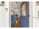 Open entryway with a view of the living room, hardwood floors, and decorative ceiling at 419 W Osborne Ave, Tampa, FL 33603