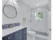 Stylish bathroom featuring modern fixtures, a glass-enclosed shower, and elegant design at 4321 Sunrise S Dr, St Petersburg, FL 33705