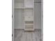 Well-organized closet features modern shelving and drawers for optimal storage in the home at 4321 Sunrise S Dr, St Petersburg, FL 33705