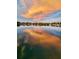Scenic water view at sunset with colorful reflections in the calm water at 4321 Sunrise S Dr, St Petersburg, FL 33705