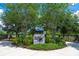 Community Bark Yard area with a secure fence and a grassy lawn for dogs to play at 4345 Cadence Loop, Land O Lakes, FL 34638