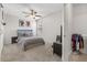 Stylish bedroom with LED lighting, a gray bed, and a window, plus a closet for storage at 4345 Cadence Loop, Land O Lakes, FL 34638