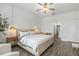 Inviting bedroom features hardwood floors, natural lighting, and a work desk at 4345 Cadence Loop, Land O Lakes, FL 34638