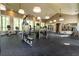 Fitness center features modern gym equipment, including weights and treadmills, with large windows at 4345 Cadence Loop, Land O Lakes, FL 34638