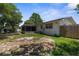 Backyard with a screened-in porch at 4499 Collins Rd, Spring Hill, FL 34606