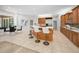 Well-appointed kitchen with barstool seating at the island and open to the breakfast nook at 4962 Turtle Creek Trl, Oldsmar, FL 34677