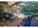 Inviting screened pool patio with comfortable seating and stylish decor provides the perfect relaxation space at 4962 Turtle Creek Trl, Oldsmar, FL 34677
