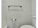 Close-up shot of the bathroom showing a metal towel rack at 5053 Lofton Dr, New Port Richey, FL 34652