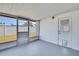 Enclosed patio featuring a door with a dog door and outdoor views at 5053 Lofton Dr, New Port Richey, FL 34652