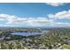 Breathtaking aerial view of the expansive lake, coastal regions, and luxury homes in this community at 510 33Rd N Ave, St Petersburg, FL 33704