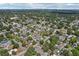 Extensive aerial view of a residential neighborhood with mature trees, showcasing community layout at 510 33Rd N Ave, St Petersburg, FL 33704