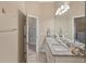 Bathroom with double sinks, granite counters, and ample cabinet space at 510 33Rd N Ave, St Petersburg, FL 33704