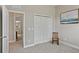 Bedroom featuring closet and doorway to adjoining bathroom at 510 33Rd N Ave, St Petersburg, FL 33704