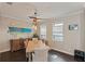 Bright dining room featuring natural wood table, modern decor, and natural lighting at 510 33Rd N Ave, St Petersburg, FL 33704