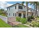Charming two-story home with a manicured lawn, fenced yard, and inviting front porch at 510 33Rd N Ave, St Petersburg, FL 33704