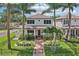 Beautiful two-story home with landscaped front yard, brick pathway, and inviting entryway at 510 33Rd N Ave, St Petersburg, FL 33704