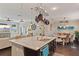 Spacious kitchen with granite counters and stainless steel sink open to living and dining areas at 510 33Rd N Ave, St Petersburg, FL 33704