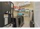 Laundry area with modern washer and dryer, and built-in shelves for extra storage at 510 33Rd N Ave, St Petersburg, FL 33704