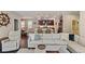 Cozy living room showcasing stylish decor and an open layout to the kitchen at 510 33Rd N Ave, St Petersburg, FL 33704