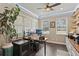 Comfortable office space with natural light, ceiling fan, and a large window at 510 33Rd N Ave, St Petersburg, FL 33704