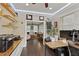 Spacious office with hardwood floors and view into adjacent living area at 510 33Rd N Ave, St Petersburg, FL 33704