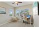 Bright home office featuring large windows and comfortable furnishings at 510 33Rd N Ave, St Petersburg, FL 33704
