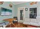Comfortable screened lanai with TV, patio furniture, and tile flooring at 510 33Rd N Ave, St Petersburg, FL 33704