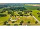 Expansive property featuring a charming single-Gathering home, pool, and lush greenery at 5100 Lockhart Rd, Brooksville, FL 34602