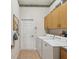 Laundry room with full size washer and dryer at 5100 Lockhart Rd, Brooksville, FL 34602