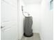 This utility closet features a gray water heater at 5510 12Th St, Zephyrhills, FL 33542