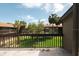 Balcony with grassy view and palm trees at 6324 Newtown Cir # 24B1, Tampa, FL 33615
