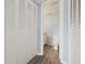 Hallway bathroom with closet, vanity and sink at 6324 Newtown Cir # 24B1, Tampa, FL 33615