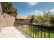 Relax on the spacious patio with a great view of the lawn and tropical landscaping at 6324 Newtown Cir # 24B1, Tampa, FL 33615