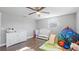 This bedroom is set up as a baby's room and includes a changing table and baby bed at 6334 Hyperion Dr, Port Richey, FL 34668