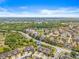 Beautiful aerial view of the community featuring lush landscaping and well-maintained homes at 6974 Holly Heath Dr, Riverview, FL 33578