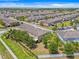 Community aerial showcasing colorful townhomes, manicured lawns, and a Gathering-friendly neighborhood layout at 6974 Holly Heath Dr, Riverview, FL 33578
