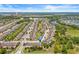 Planned community with townhomes, landscaping, and nearby lake and highway access; great location at 6974 Holly Heath Dr, Riverview, FL 33578