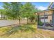 A spacious backyard featuring a white privacy fence and a screened-in patio, perfect for outdoor living at 6974 Holly Heath Dr, Riverview, FL 33578