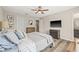 Bedroom featuring a ceiling fan and en suite bathroom at 6974 Holly Heath Dr, Riverview, FL 33578
