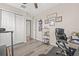 Office with sleek hardwood floors, decorative wall art and desk for comfortable work at 6974 Holly Heath Dr, Riverview, FL 33578
