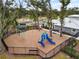 Fenced playground with slides and swing set at 6974 Holly Heath Dr, Riverview, FL 33578