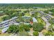 Desirable community with mature trees, carports, and well maintained landscaping from an aerial view at 70 Cypress Pl, Oldsmar, FL 34677