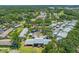 Desirable community with mature trees, carports, and well maintained landscaping from an aerial view at 70 Cypress Pl, Oldsmar, FL 34677