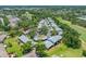 Desirable community with mature trees, carports, and well maintained landscaping from an aerial view at 70 Cypress Pl, Oldsmar, FL 34677