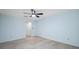Bright bedroom with neutral carpet and a large closet at 70 Cypress Pl, Oldsmar, FL 34677