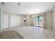 Bright dining area with tile flooring and sliding doors to the outdoor patio at 70 Cypress Pl, Oldsmar, FL 34677