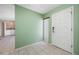 Foyer with tile flooring, neutral paint, and a secure-looking front door at 70 Cypress Pl, Oldsmar, FL 34677